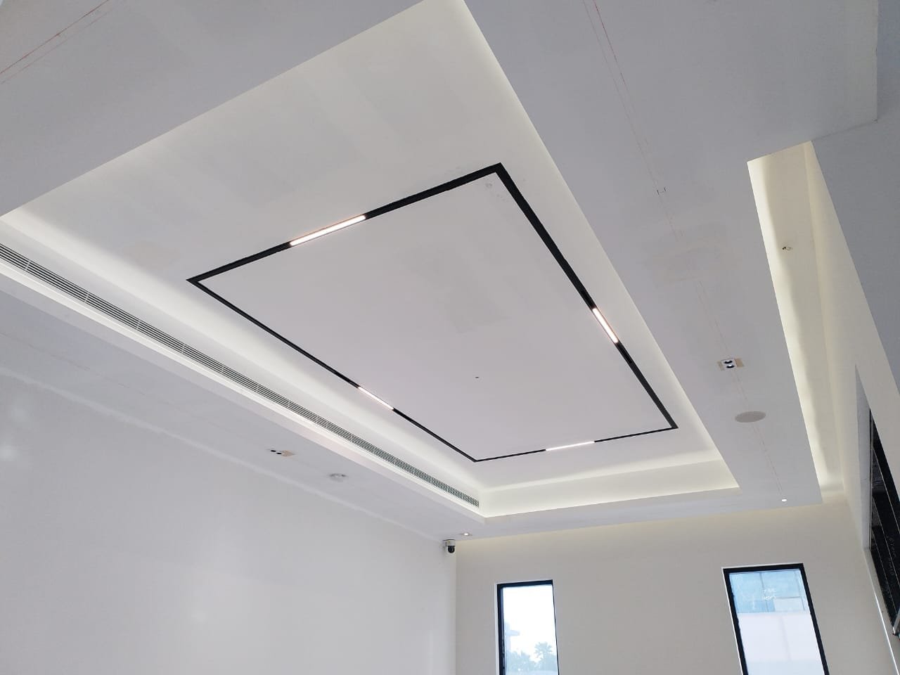 False ceiling grid with recessed downlights