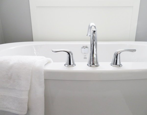 Plumbing pipework connected to a tap